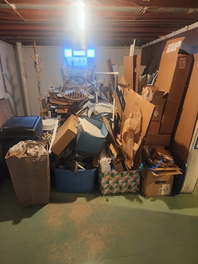 Roll-off dumpster container at job site for 2 Yard Dumpster Rental in Nashville